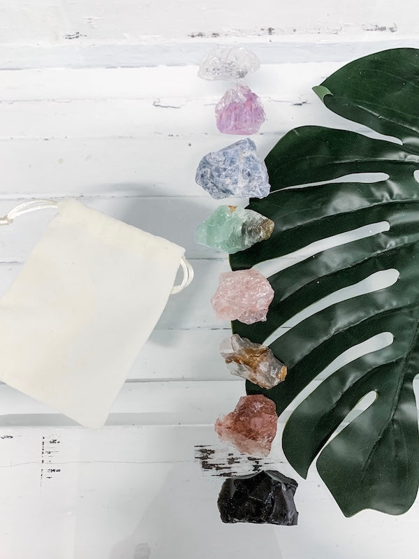 A set of rough cut crystals to balance the chakras, by The Purist Collection